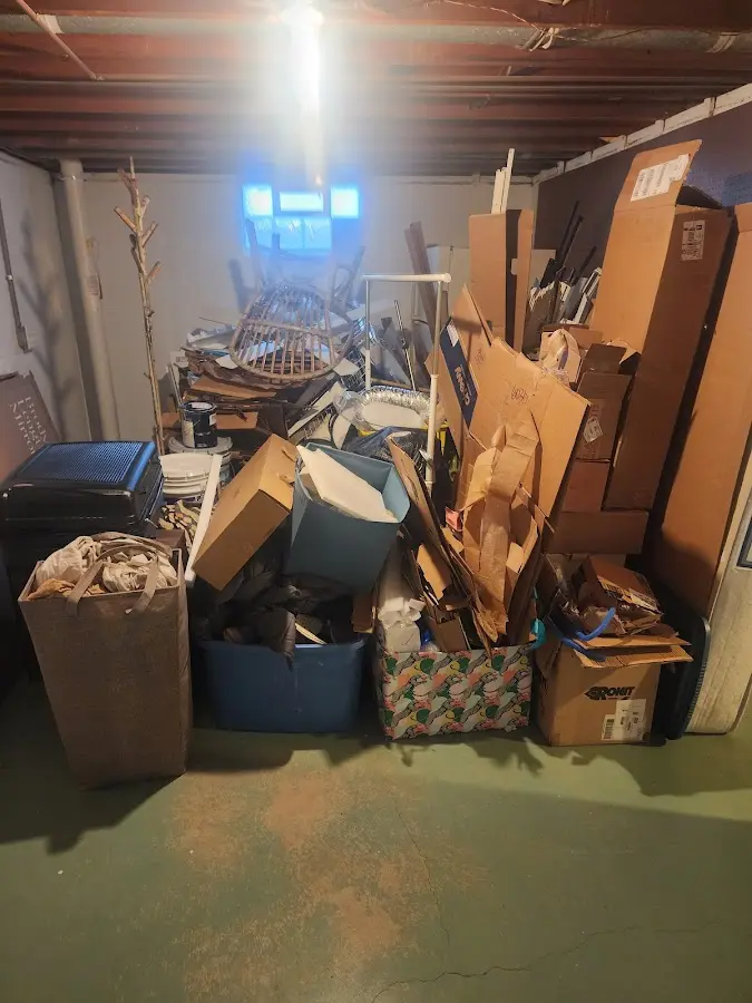 Roll-off dumpster container at job site for 2 Yard Dumpster Rental in Meridianville